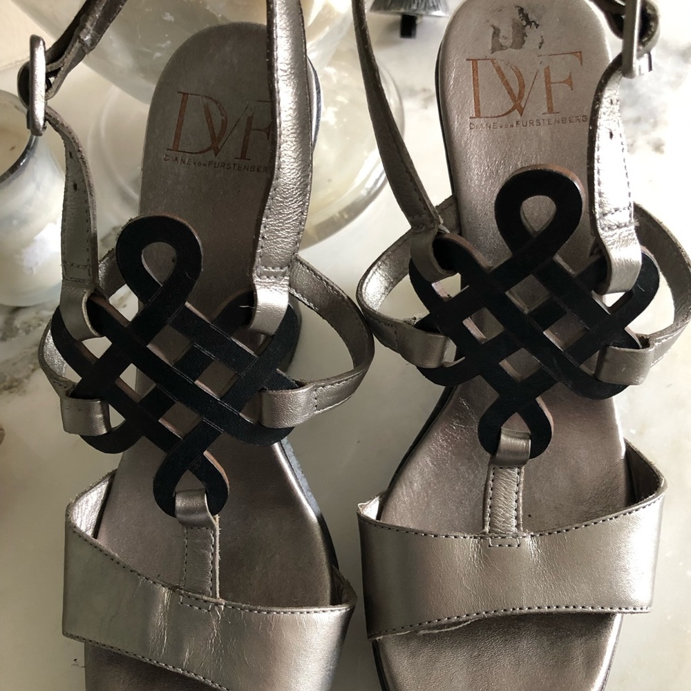 Diane Von Furstenberg metallic w/ leather emblem